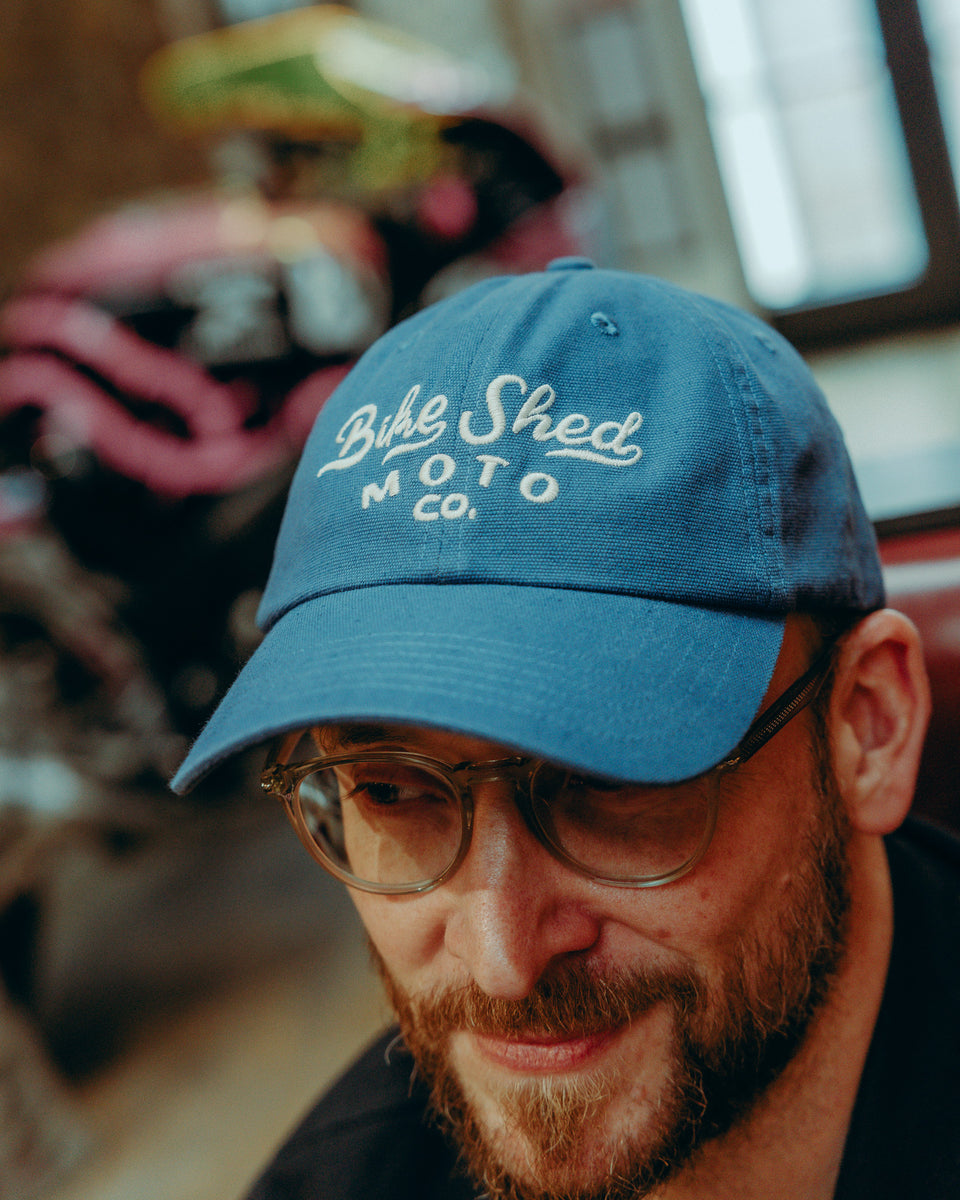 BSMC Desert Race Cap - Blue worn by model logo close up
