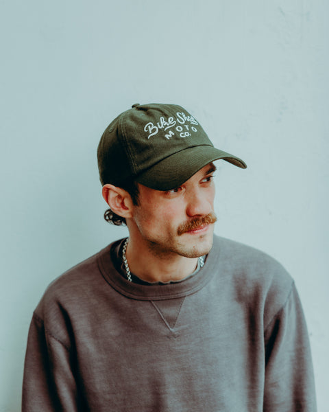 BSMC Desert Race Cap - Green worn by model on white background