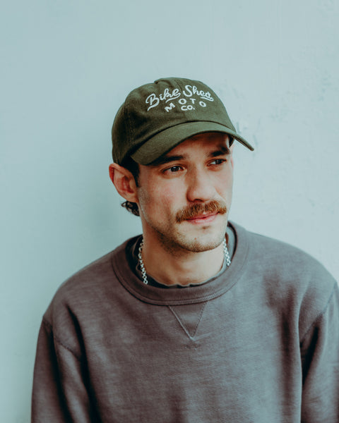 BSMC Desert Race Cap - Green worn by model on white background