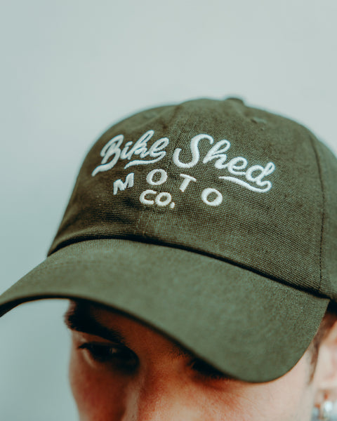 BSMC Desert Race Cap - Green worn by model close up logo