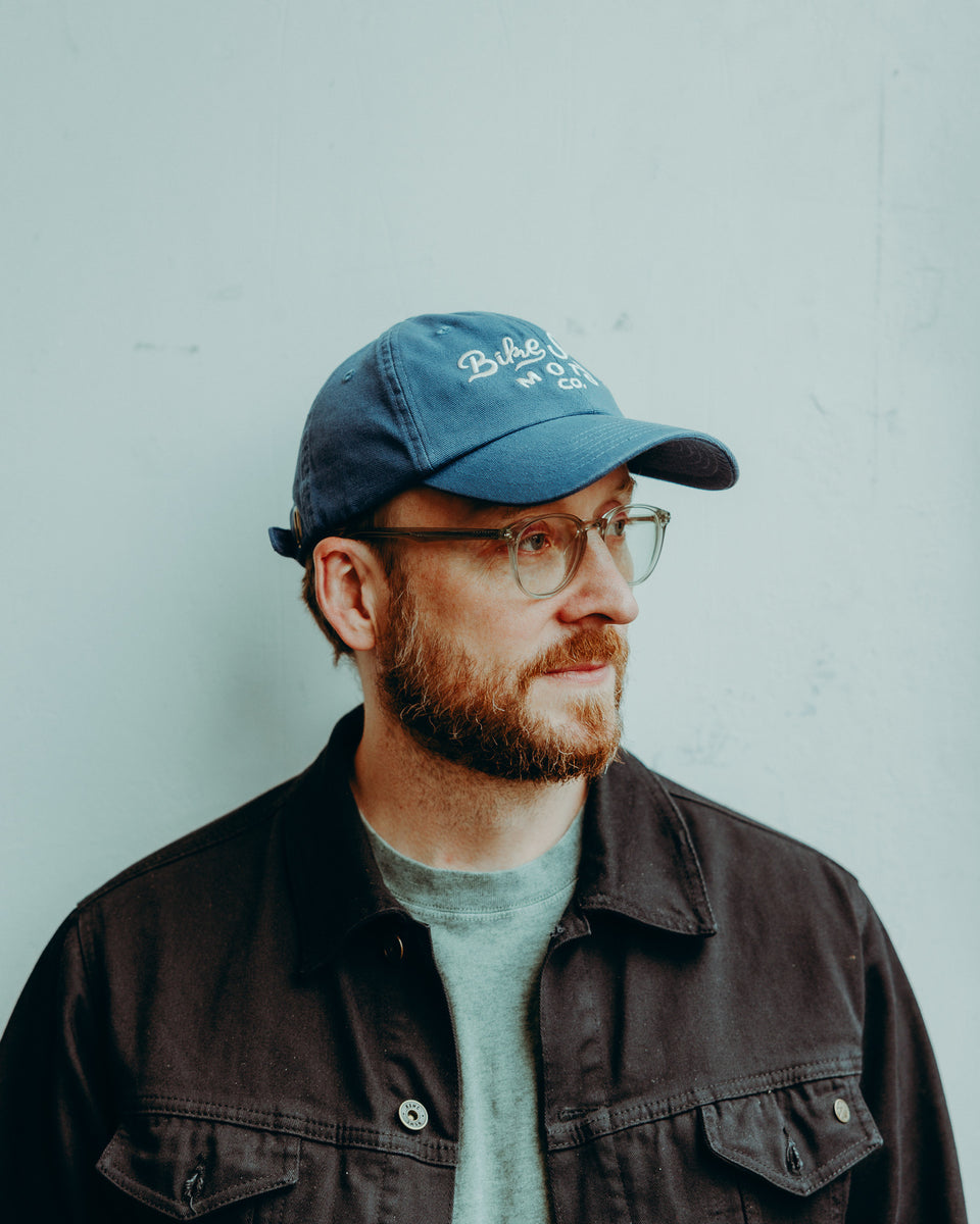 BSMC Desert Race Cap - Blue worn by model on white background
