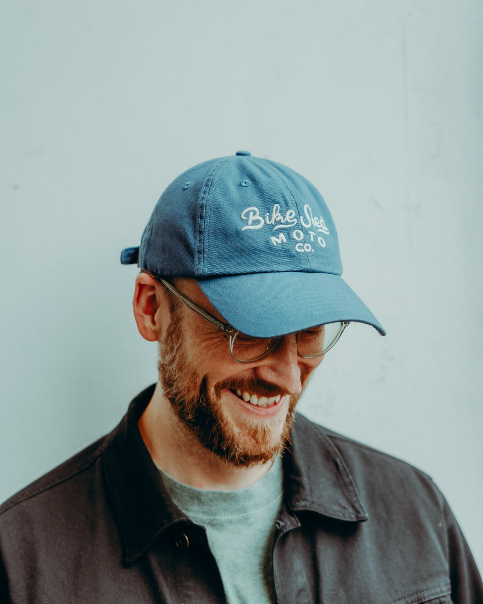 BSMC Desert Race Cap - Blue worn by model on white background