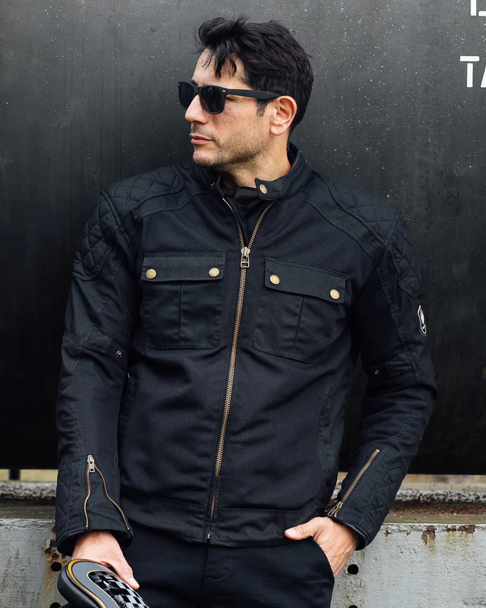 Merlin Shenstone 2 air jacket black worn by model in front of black background