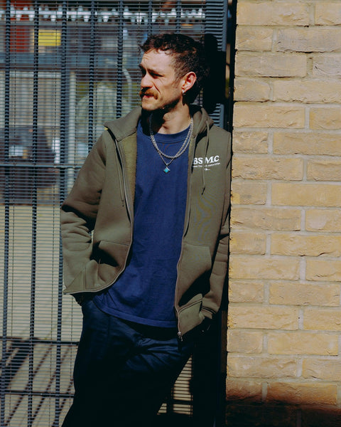 Model wearing Green Bike Shed Motorcycle Co. Good Times Hooded Sweatshirt 